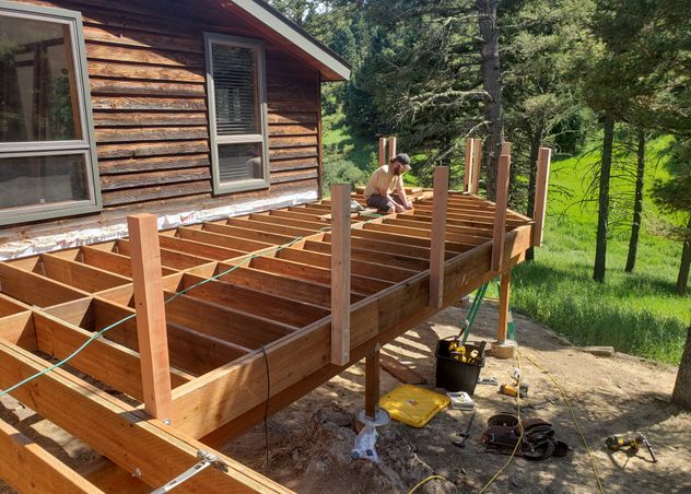 A picture of framing for a deck in the Bridger canyon. 