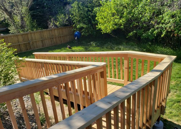 A wooden deck handicap ramp