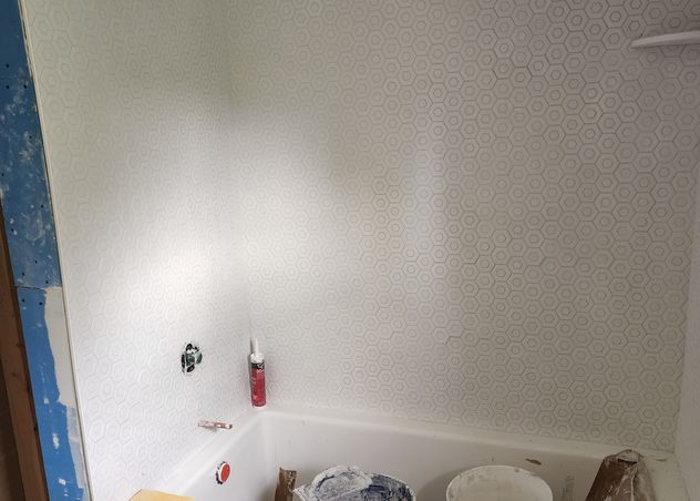 Taping around bathroom remodel in bozeman by Hutch Construction