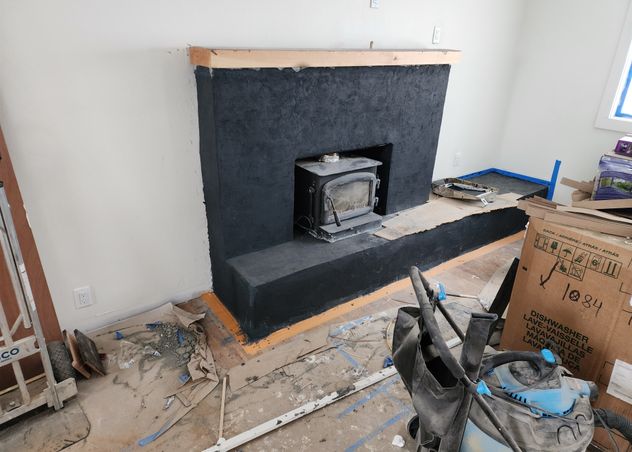 recoating of a brick fireplace with stucko