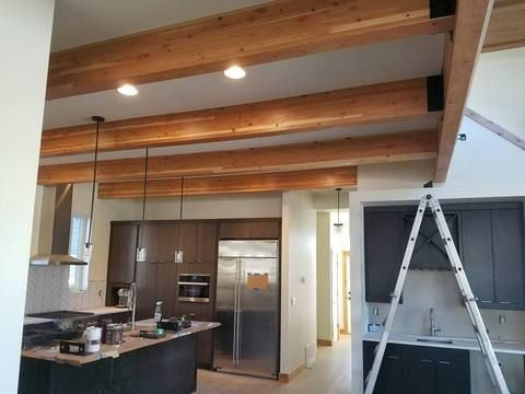 Interior beams in a finished kitchen