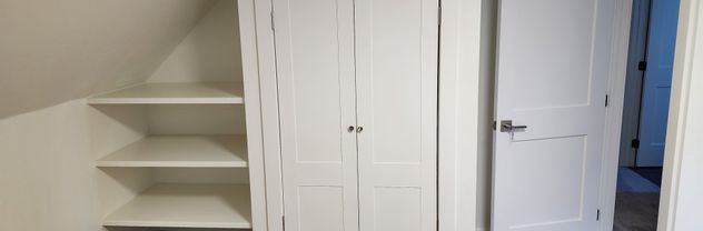 Interior remodel of 1920s home with barn door insert by Hutch Construction